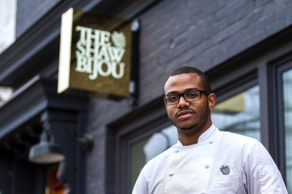 Executive chef Kwame Onwuachi in front of the pricey Shaw Bijuou restaurant, whcih charged nearly $1,000 for dinner for two and closed lest than 2 1/2 months after opening. (Photo: Aaron Lyle)