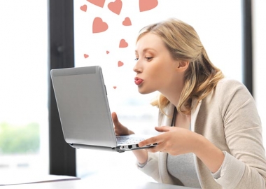 Feeling lovestruck online? Make sure your love interest really is who they say they are. (Photo: Syda Productions)