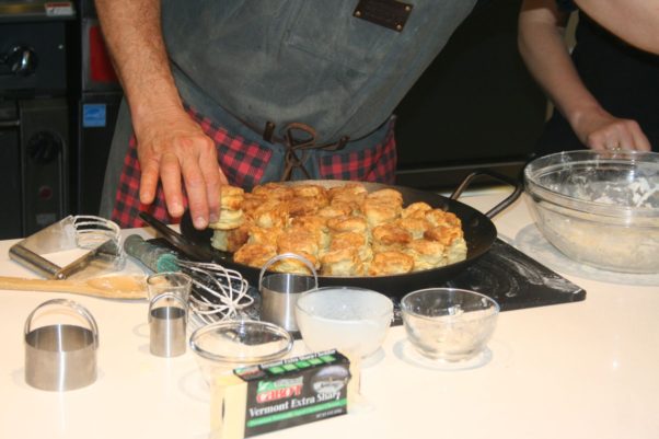 Chef Jimmy Kennedy serves up his cheddar buttermilk biscuits. (Photo: Mark Heckathorn/DC on Heels)