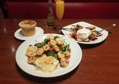 Mimi's Cafe is offering a three-course meal for $18.99 includig this French onion soup (from lef), fire grilled shrimp brochette with baked cheesy gratin potatoes and house salad, and a seasonal muffin sundae. Add a mini-mosa for $5. (Photo: Mark Heckathorn/DC on Heels)