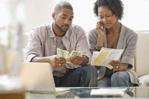 Figure out your finances before marrying your significant other to avoid unnecessary stress. (Photo: Jose Luis Pelaez/Getty Images)  