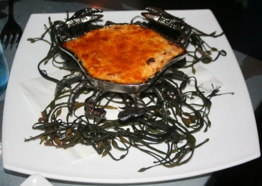 The flaming crab dip is served in a crab-shaped pan and flambeed tableside. (Photo: Mark Heckathorn/DC on Heels)