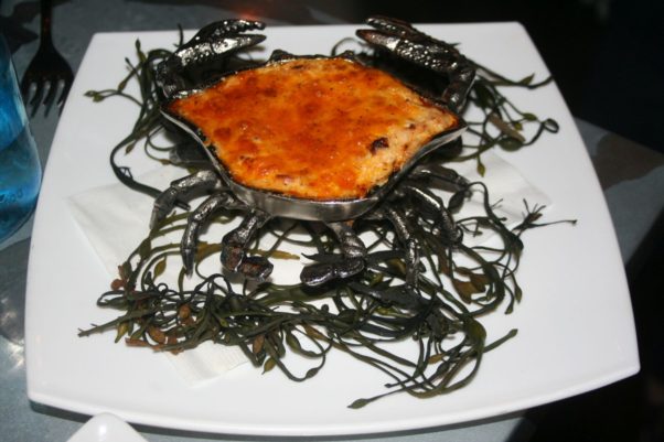 The flaming crab dip is served in a crab-shaped pan and flambeed tableside. (Photo: Mark Heckathorn/DC on Heels)