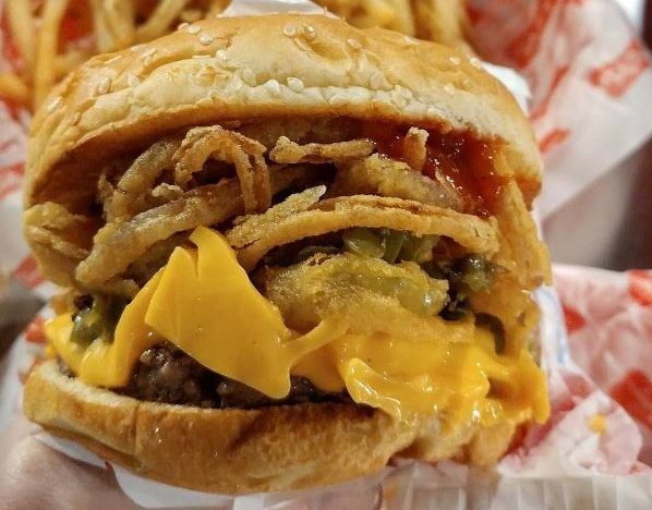 Tasty Burger has added several new items to its D.C. menu including the Mama Burger topped with fried pickles, roasted jalapenos, fried onions and smoky BBQ sauce. (Photo: Tasty burger/Instagram)