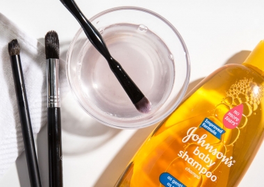 To wash natural bristle brushes, swirl them in a bowl of baby shampoo and water. (Photo: Tom Newton)