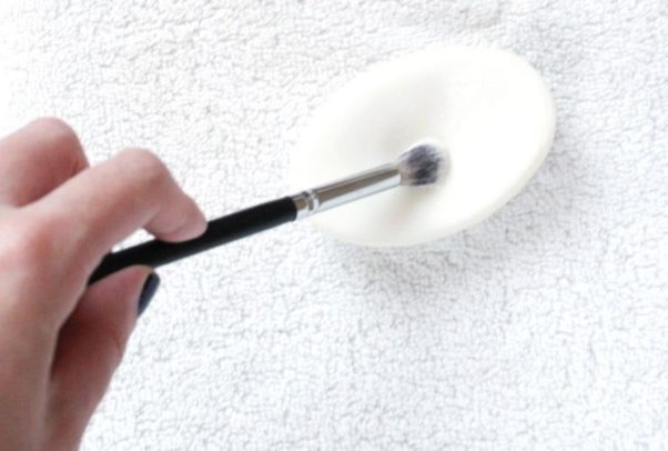 To clean synthetic brushes, stroke the bristles on a bar of soap then rinse. (Photo: Meg O. on the Go)