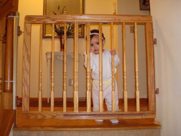 Hardware-mounted baby gates should be used on stairs rather than pressure-mounted versions. (Photo: Prep Talk)