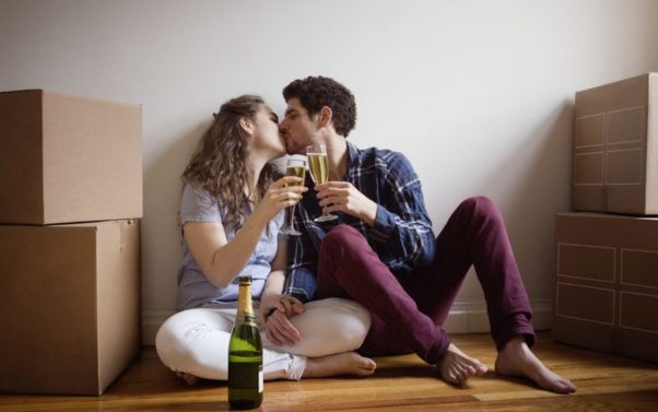 After a long day of moving in, it is only right to celebrate as a couple. (Photo: HuffPost)