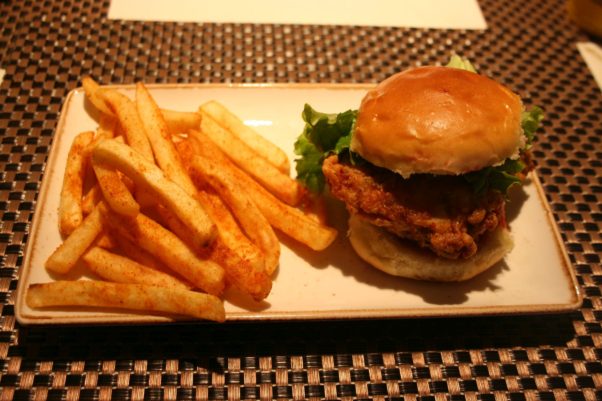 The chicken farcha burger and gunpowder fries is one of the new dishes on the expanded menu. (Photo: Mark Heckathorn/DC on Heels)