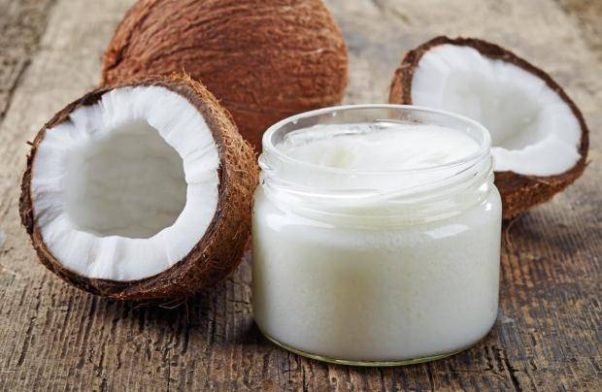 Coconut oil keeps your strands shiny and moisturized. (Photo: Shutterstock)