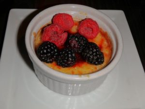 Try the caramel crème brule with fresh berries for dessert. (Photo: Nick Bullock/DC on Heels)