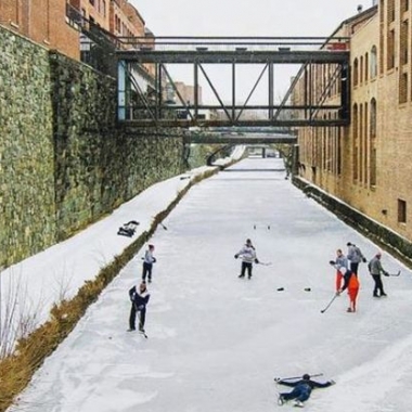 Local skaters play a game of ice hockey on the C&O Canal in Georgetown during the rececent freeze. (Photo: zacdendi/Instagram)