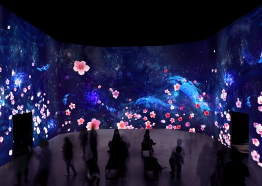 Sakura Yume/Cherry Blossom Dream at Artechouse takes visitors through a moonlit floating digital environment where larger-than-life koi fish and colorful cherry blossom petals react to their presence. (Photo: Artechhouse)