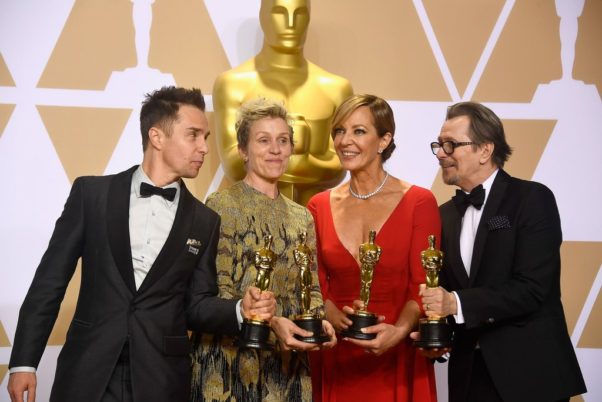 Sam Rockwell (l to r),, Frances McDormand, Allison Janney and Gary Oldham celebrate their acting Oscars backstage. (Photo: Getty Images)