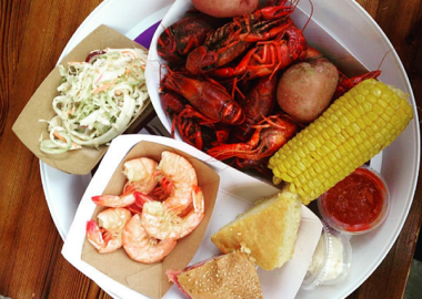 For $35, diners will get a pound of Louisiana crawfish with corn on the cob, new potatoes, coleslaw, mini muff-a-lottas and cornbread. (Photo: Bayou Bakery)