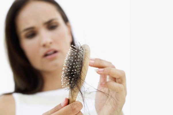 If you comb your hair soaking wet, you are bound to tear out pieces of your hair that are already brittle. (Photo: Getty Images)