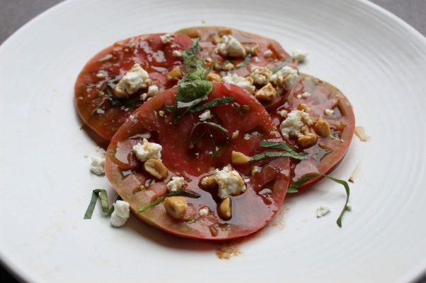 Heirloom tomatoes from the rooftop was on the bar menu recently served with basil, blue cheese and a balsamic vinaigrette. (Photo: Mark Heckathorn/DC on Heels) 