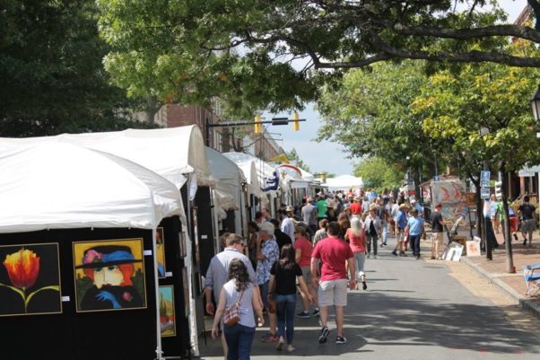 People walking along booths at the 2017 King Street Art Festival in Old Town. (Photo: Howard Alan Events)