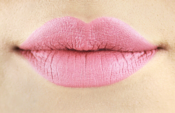 Pastel pink neutral lip colors are in this season. You can wear this look to work because of its soft pink color. (Photo: Ofra Cosmetics)