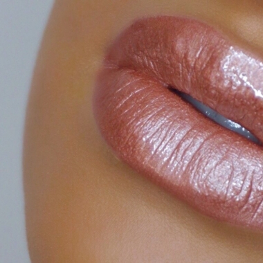 Metallic lips are sexy, but can also be used in your everyday routine if the color is neutral or a classy, dark berry color. (Photo: AJ Crimson Beauty)