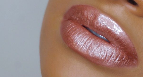 Metallic lips are sexy, but can also be used in your everyday routine if the color is neutral or a classy, dark berry color. (Photo: AJ Crimson Beauty)