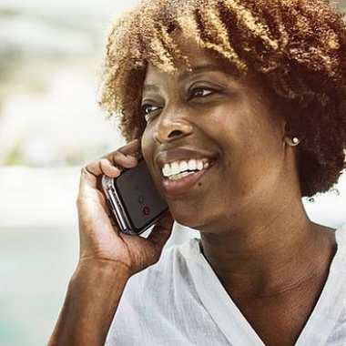 An African American woman talking on her cell phone. (Photo: rawpixel/Pexel)