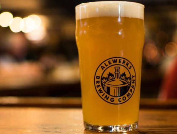 An Aleworks Brewing Company glass filled with beer sitting on a bar. (Photo: Alewerks Brewing Co.)