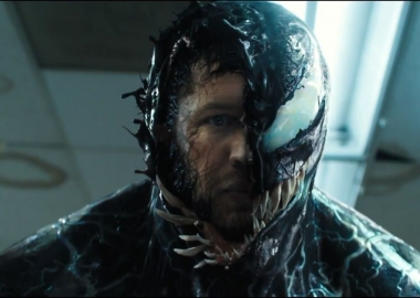 Tom Hardy changing into Venom. (Photo: Sony Pictures)