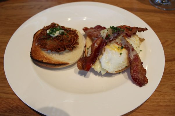The egg sandwich from Blue Collar in Miami with two eggs over easy, a potato latke, white cheddar, bacon and garlic aioli on a sweet Portuguese muffin.  (Photo: Mark Heckathorn/DC on Heels)