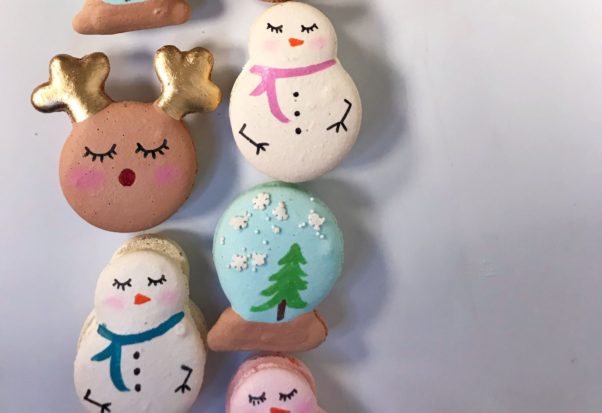 Macarons decorated as reindeer, snowmen and snow globes. (Photo: Buttercream Bakeshop)