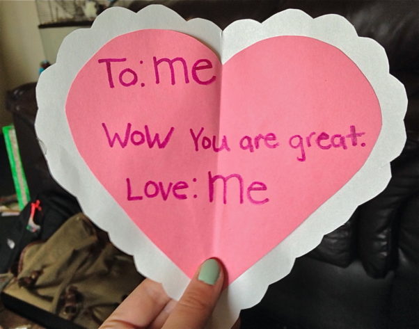 A homemade pink and white valentine card with hand printed letters that say: To: me, Wow you are great. Love: me. (Photo: Sarah Caskie)