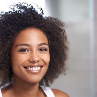 Closeup portrait of a naturally beautiful black woman. (Photo: Getty Images)