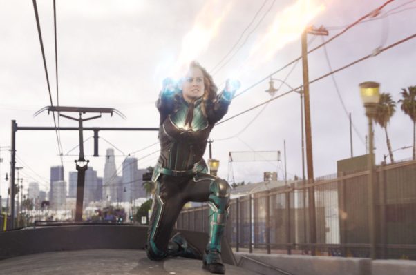 Captain Marvel (Brie Larson) shoots power out of her hands while on top of a subway train. (Photo: Marvel Studios)
