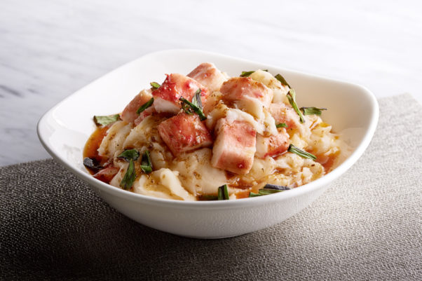 Mashed potatoes with chunks of crab meat on top. (Photo: Oceanaire)