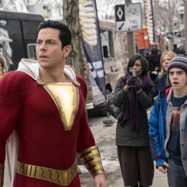 Shazam (Zachary Levi) and Freddy Freman (Jack Dylan Grazer) look at something happening out of picture. (Photo: Warner Bros. Pictures)