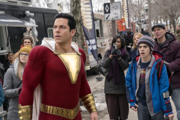 Shazam (Zachary Levi) and Freddy Freman (Jack Dylan Grazer) look at something happening out of picture. (Photo: Warner Bros. Pictures)