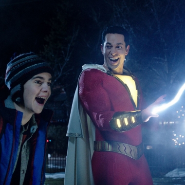 Freddy Freman (Jack Dylan Grazer) and Shazam (Zachary Levi) laugh as lightning shoots out of Shazam's hands. (Photo: Warner Bros. Pictures)