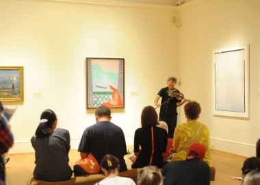 Museum visitors listening to a violinist at The Phillips Collection. (Photo: The Phillips Collection)