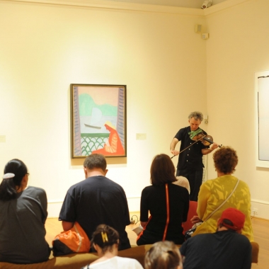Museum visitors listening to a violinist at The Phillips Collection. (Photo: The Phillips Collection)