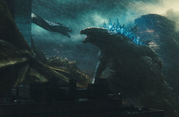 King Ghidorah (left) and Godzilla (right) fight. (Photo: Warner Bros. Pictures)