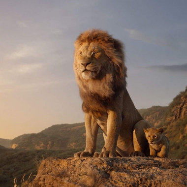 Scar and Simba sit together on top of a mountain. (Photo: Walt Disney Studios)