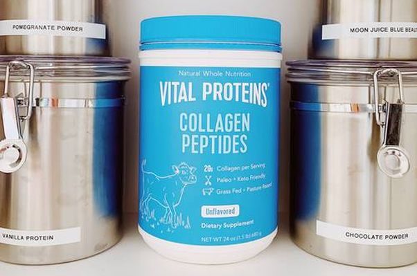 Container of Vital Protein’s Collagen Peptides siting between other canisters in a cabinet. (Photo: Danielle Goldmark)
