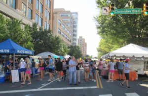 People walking among the booths at last year's Clarendon Day. (Photo; WMAL)