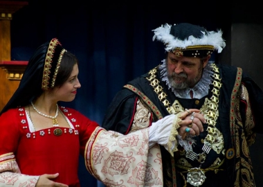 Anne Bolyn and King Henry VIII stroll through the Maryland Renaissance Festival holding stands. (Photo: Keith Heffner)