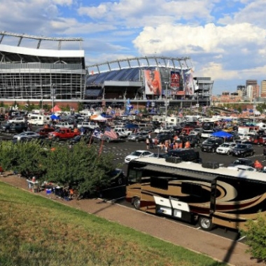 Cars and RVs parked outside a football stadium. (Photo: Getty Images)