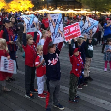 Fans holdng up signs at a World Series watch party last weekend at Yards Park. (Photo: Capital Riverfront)