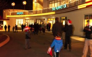 Kids wearing Santa hats and their parents walk into the Arcade at Glen Echo Park. (Photo: Glen Echo Park)