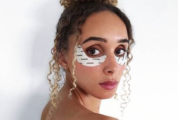 A woman using anti-wrinkle eye revitalizer with hydrogel patches under her eyes. (Photo: Cassandra Caldwell/Instagram)