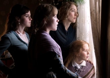 Meg March (Emma Watson), Amy March (Florence Pugh), Jo March (Saoirse Ronan) and Beth March (Eliza Scanlen) look out a window. (Photo: Sony Pictures)
