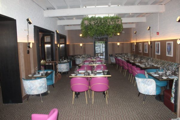Annabelle's main dining room with plants hanging from ceiling. (Photo: Mark Heckathorn/DC on Heels)